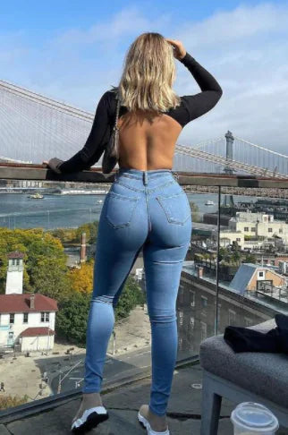 Vaqueros ajustados de cintura alta en azul cielo con bolsillos oblicuos