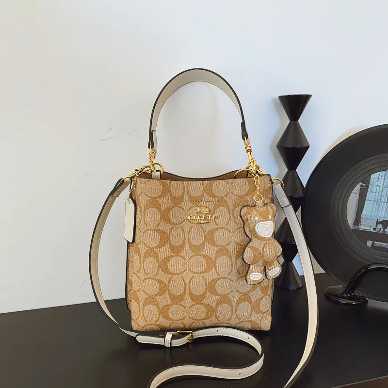 Bolso elegante y lujoso en forma de cubo