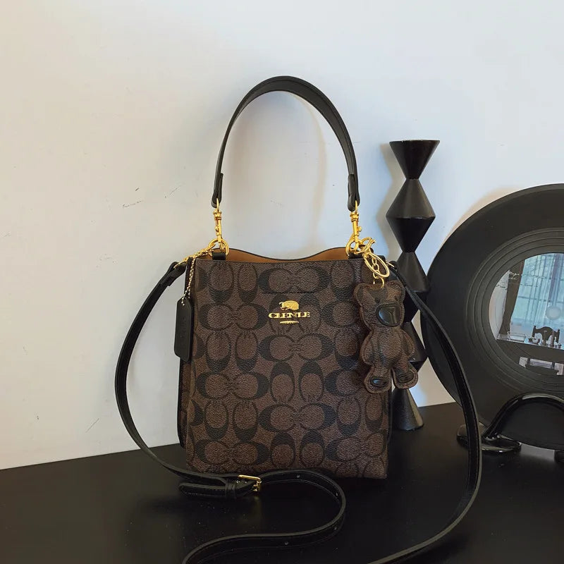 Bolso elegante y lujoso en forma de cubo