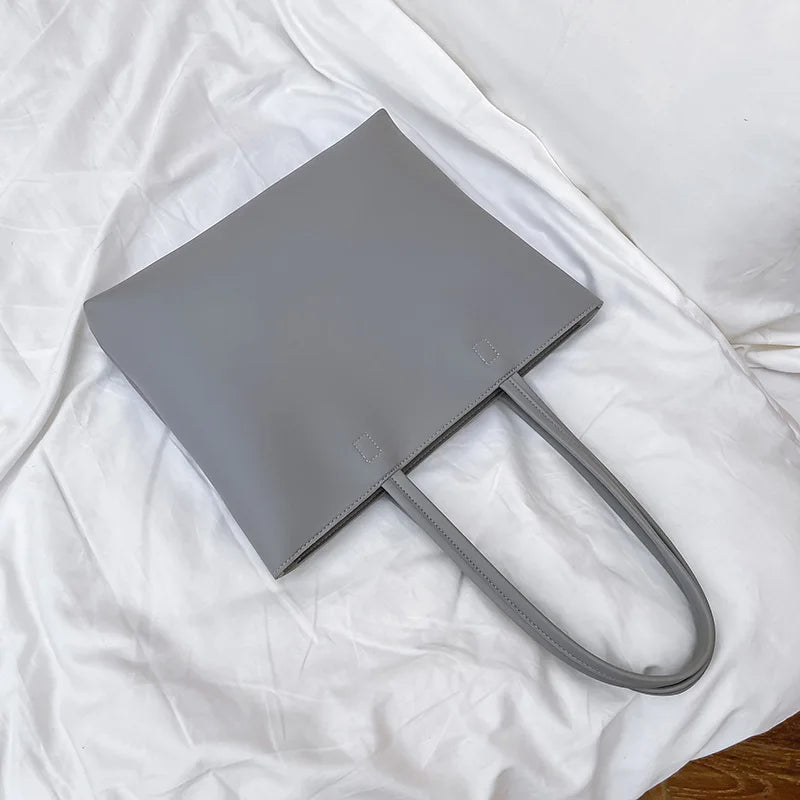 Bolso de mano, de gran capacidad, sencillo