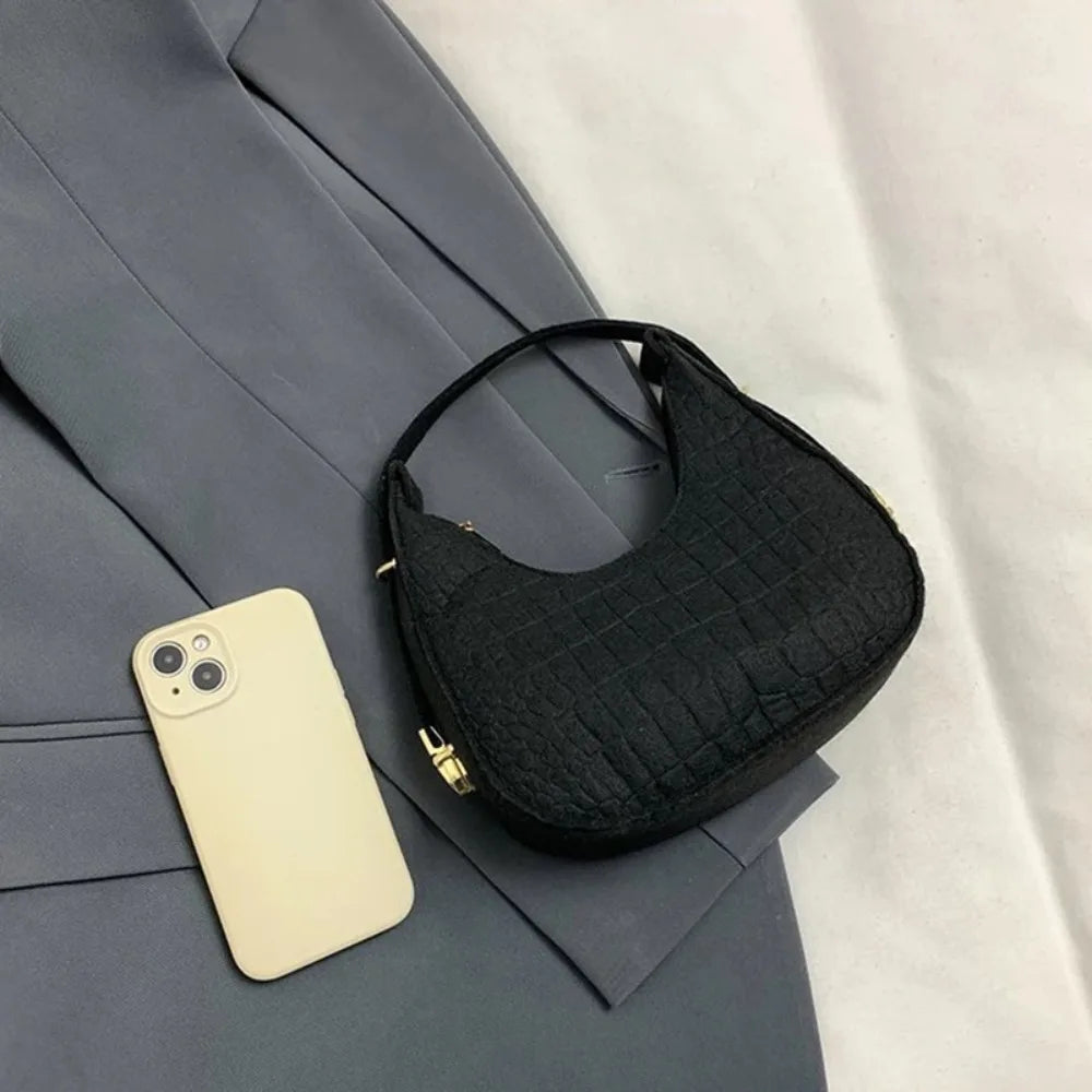 Bolso de mano de fieltro